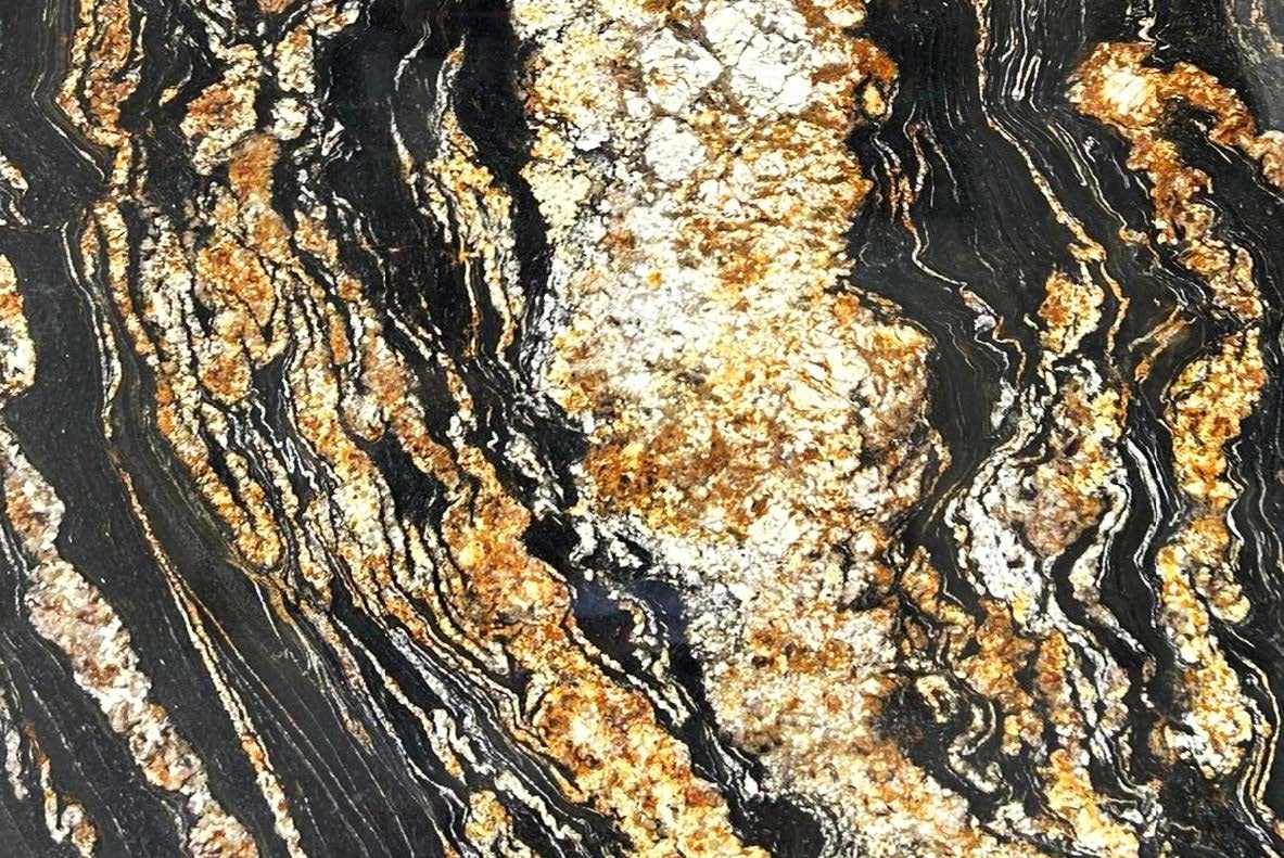 Magma Golden Quartzite: Thick gold veins command the centre stage on this luxurious black stone, adding regal beauty to any space.